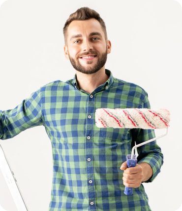 cheerful-man-with-paint-roller-Z5XMNCM.jpg